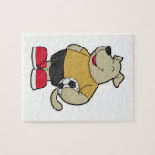 サッカーボールを持つサッカー選手の犬 ジグソーパズル (横)