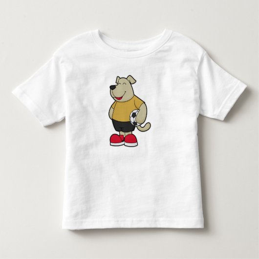 サッカーボールを持つサッカー選手の犬 トドラーTシャツ (正面)