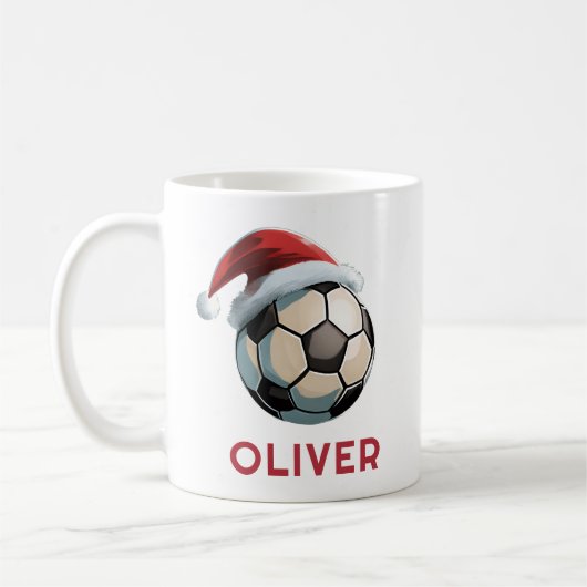 サッカーボール 赤いサンタ帽子 名前入り クリスマス コーヒーマグカップ (左)
