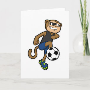 サッカー選手としてサッカーをするサル カード