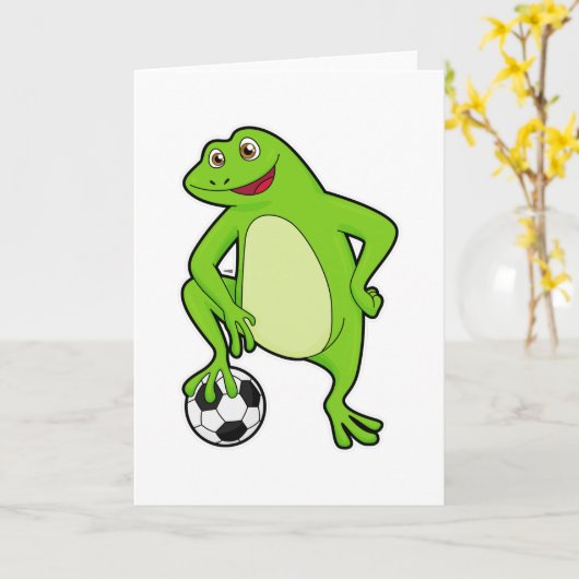 サッカー選手としてフットボールと共にいるカエル カード (黄色い花)