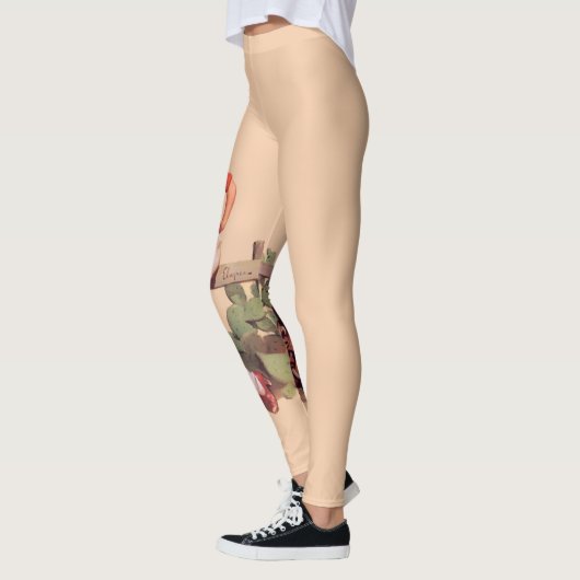 サドルおよびロデオの印を持つヴィンテージの女性のカーボーイ レギンス (左)