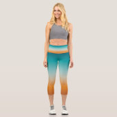 サニかわいらしーグラデーションオレンジ&ティール(緑がかった色)ブルーグラデーション カプリレギンス (正面)