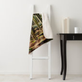 サボティの庭。緑の丈の高いサボテンと多汁の植物が育つ シェルパブランケット (インサイチュ)