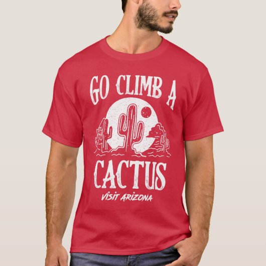 サボテンに登ってアリゾナアメリカを訪れよう 面白い Tシャツ (正面)