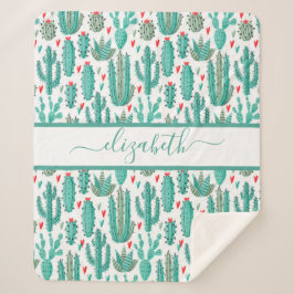 サボテンの緑の白いパターンのモノグラム シェルパブランケット