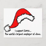 サポおもしろいートSanta シーズンポストカード<br><div class="desc">シンプルSanta Hatグラフィックと文字:...  Santaをサポート-世界最大の小人会社</div>