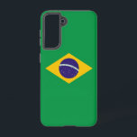 サムスンギャラクシーS21ブラジル国旗 SAMSUNG GALAXY S21ケース<br><div class="desc">ブラジルの旗を特集した私たち独占的の電話カバーでサムスンギャラクシーS21を変身！詳細に細心の注意を払って作られた、この電話カバーは誇らしげにブラジル国旗の象徴的なデザインを示す。この旗は中央に黄色いダイヤモンドが付いた緑のフィールドを特徴としており、リオ・デ・ジャネイロ上空の夜空のパターンに27個の白い星が配置された青い球体がブラジルの空を象徴している。また、この旗には「Ordem e Progresso」(「Order and Progress」)というナショナル・モットーを持つバナーが含まれている。あなたはのブラジ祝ルの伝統、国のプライドを示すか、単に国旗の象徴を鑑賞するかにかかわらず、このカバーはあなたのデバイスにブラジル文化の本物のtouchを追加する。素材で作ら高品質れ、このブラジル国旗の電話カバーは耐久性と視覚的に印象的な外観を保証し、毎日の必需品に完璧な追加を行う。お使いのブラジ保護ルに対して表現、お客様の電話に合わせて設計されている。</div>