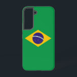 サムスンギャラクシーS22ブラジル国旗 SAMSUNG GALAXY S22ケース<br><div class="desc">ブラジルの旗を特集した私たち独占的の電話カバーでサムスンギャラクシーS22を変身！詳細に細心の注意を払って作られた、この電話カバーは誇らしげにブラジル国旗の象徴的なデザインを示す。この旗は中央に黄色いダイヤモンドが付いた緑のフィールドを特徴としており、リオ・デ・ジャネイロ上空の夜空のパターンに27個の白い星が配置された青い球体がブラジルの空を象徴している。また、この旗には「Ordem e Progresso」(「Order and Progress」)というナショナル・モットーを持つバナーが含まれている。あなたはのブラジ祝ルの伝統、国のプライドを示すか、単に国旗の象徴を鑑賞するかにかかわらず、このカバーはあなたのデバイスにブラジル文化の本物のtouchを追加する。素材で作ら高品質れ、このブラジル国旗の電話カバーは耐久性と視覚的に印象的な外観を保証し、毎日の必需品に完璧な追加を行う。お使いのブラジ保護ルに対して表現、お客様の電話に合わせて設計されている。</div>