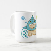 サメの衣装を着た可愛いベージュ猫、アクアシーをテーマにしたアイテム コーヒーマグカップ (正面左)