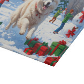 サモエドのクリスマス帽子姿の雪中疾走 カッティングボード (角)
