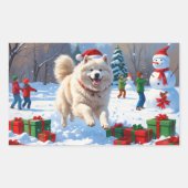 サモエドのクリスマス帽子姿の雪中疾走 長方形シール (正面)