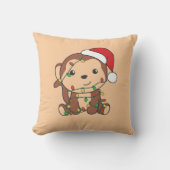 サルのクリスマス冬の動物サルがピルを投げる クッション (正面)