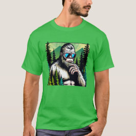 サングラスをかけた好奇心旺盛なビッグフットが森に隠れている Tシャツ