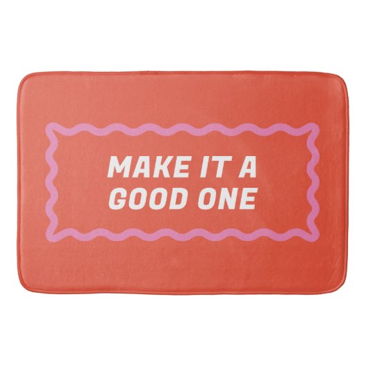 サンゴとピンクの波状の励ましの言葉 バスマット (正面)