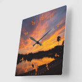 サンセットでサンダヒルクレーンのシルエットをパーソナライズ スクエア壁時計 (傾斜)