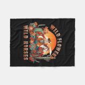 サンセット女性のカーボーイ乗馬ワイルドフラワーワイルドホ フリースブランケット (正面(横))