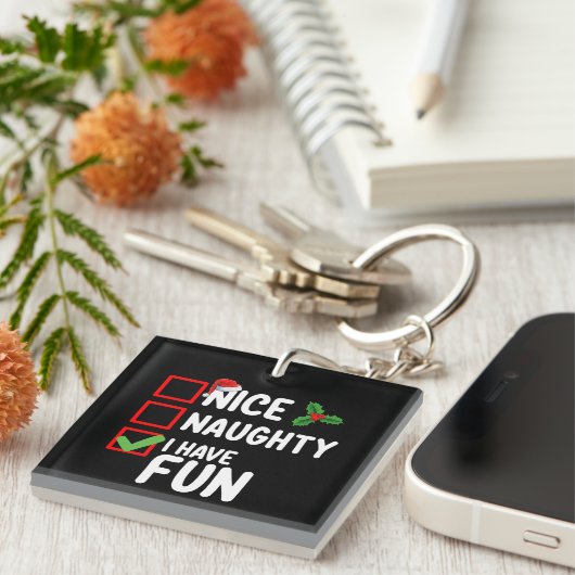 サンタいけなおもしろいのクリスマスリストを持っている キーホルダー (正面右)