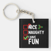 サンタいけなおもしろいのクリスマスリストを持っている キーホルダー (正面)