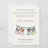 サンタおもしろいがストッキングにクリスマス現金をプレゼント シーズンカード (正面)