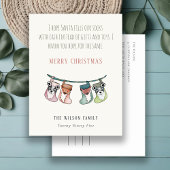 サンタおもしろいがストッキングにクリスマス現金をプレゼント シーズンポストカード