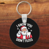 サンタおもしろいは歯医者の歯科をフロスしなかったのを知っている キーホルダー (正面)