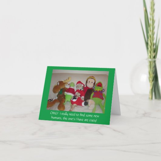 サンタおもしろいネコが人間の熱狂するクリスマスカードを持つ シーズンカード (正面)