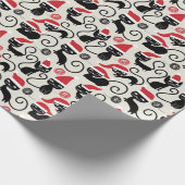 サンタおもしろいハットのクリスマスを着たかわいい子猫 ラッピングペーパー (角)