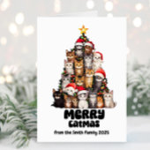 サンタおもしろいハットの猫フェスティバルツリーのクリスマス カード