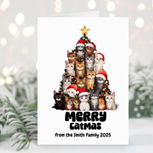 サンタおもしろいハットの猫フェスティバルツリーのクリスマス カード