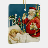 サンタおよび小さい睡眠の女の子のクリスマス セラミックオーナメント (右)