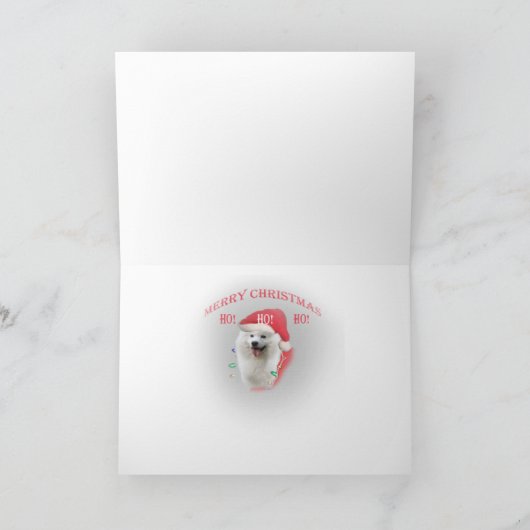 サンタおよびSamoyedの助手のメリークリスマスカード シーズンカード (内部)