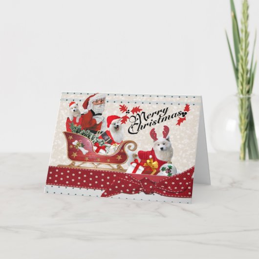 サンタおよびSamoyedの助手のメリークリスマスカード シーズンカード (正面)