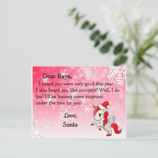 サンタからのポストカード：サンタ帽の赤いユニコーン シーズンポストカード (スタンド正面)