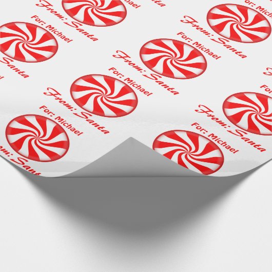 サンタからの一流のキャンディ・ケーンのペパーミントを個人化して下さい ラッピングペーパー (角)