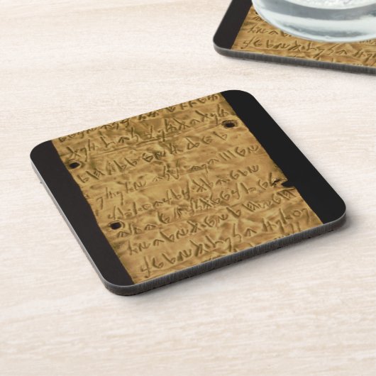 サンタからのPhoenicianの銘刻文字が付いている金ゴールドプレート、 コースター (左側)