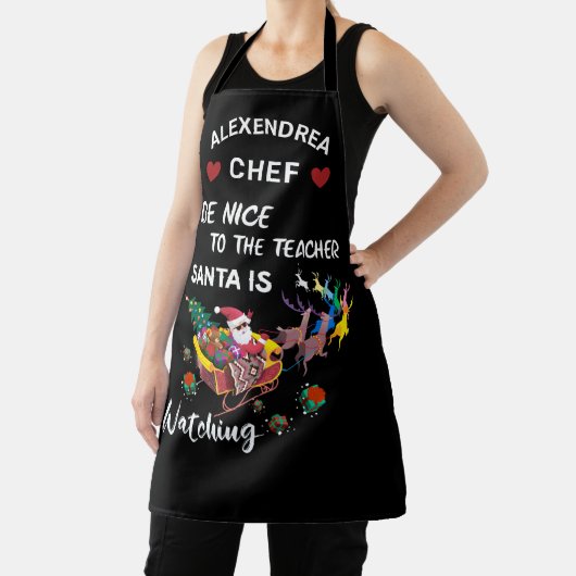 サンタがおもしろいを見ている先生に優しい エプロン (インサイチュ)
