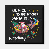 サンタがおもしろいを見ている先生に優しい マグネット (正面)
