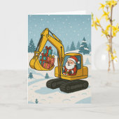 サンタがギフトを積んだ掘削機を運転するクリスマスカード カード (黄色い花)
