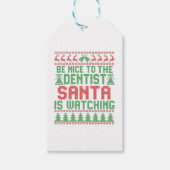 サンタがクリスマスを見ている歯医者に親切にする ギフトタグ (正面)