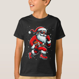 サンタがフットボールをプレーする男性・少年・クリスマス・アメフト Tシャツ