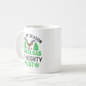 サンタがリストを持っている理由いけなは コーヒーマグカップ (正面左)