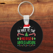 サンタが家族のジョークを見ているナースに優しい キーホルダー (正面)