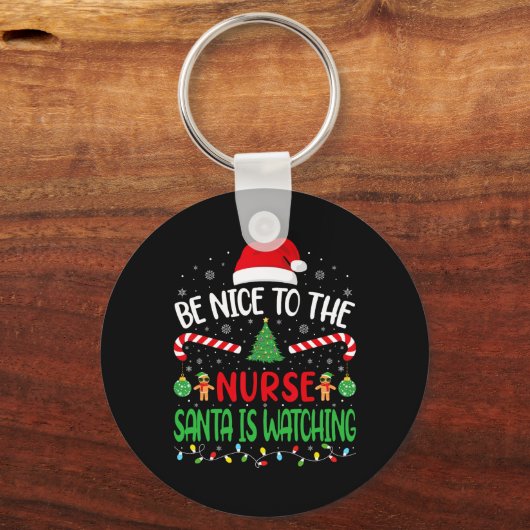 サンタが家族のジョークを見ているナースに優しい キーホルダー (正面)