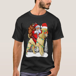 サンタが帽子をかぶったプードル犬にまたがるクラウス クリスマス Tシャツ
