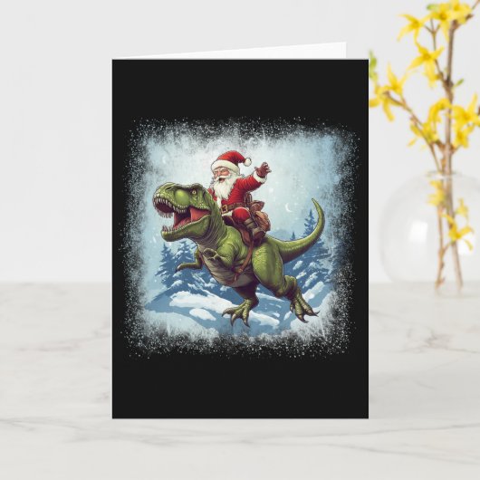 サンタが恐竜ティラノサウルスに乗るおもしろクリスマス カード (黄色い花)