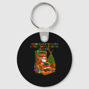 サンタが本を読む面白い67のミームTシャツ クリスマスの先生ギフト キーホルダー