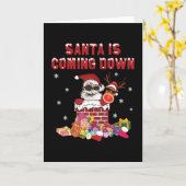 サンタが煙突から降りてくる カード (黄色い花)