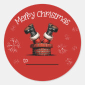 サンタが煙突に刺さったクリスマスプレゼントラベルシール ラウンドシール (正面)