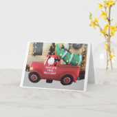 **サンタが特別なクリスマスの願いを届けている** カード (黄色い花)